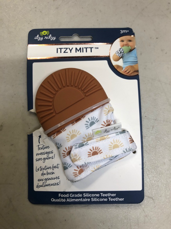 Photo 2 of Itzy Ritzy Silicone Teething Mitt – Soothing Infant Teething Mitten with Adjustable Strap, Crinkle Sound and Textured Silicone to Soothe Sore and Swollen Gums, Terracotta Sun