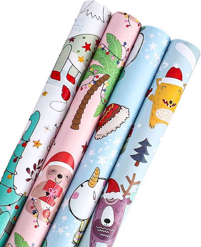 Photo 1 of AUCLAY Christmas Wrapping Paper Rolls for Kids Holiday Gift Wrap - Cute Styles Included Dinosaur, Snowman, Santa Animals, Alpaca and Sloth - Pack of 4, 23.6 Inch X 8 Feet per Roll
