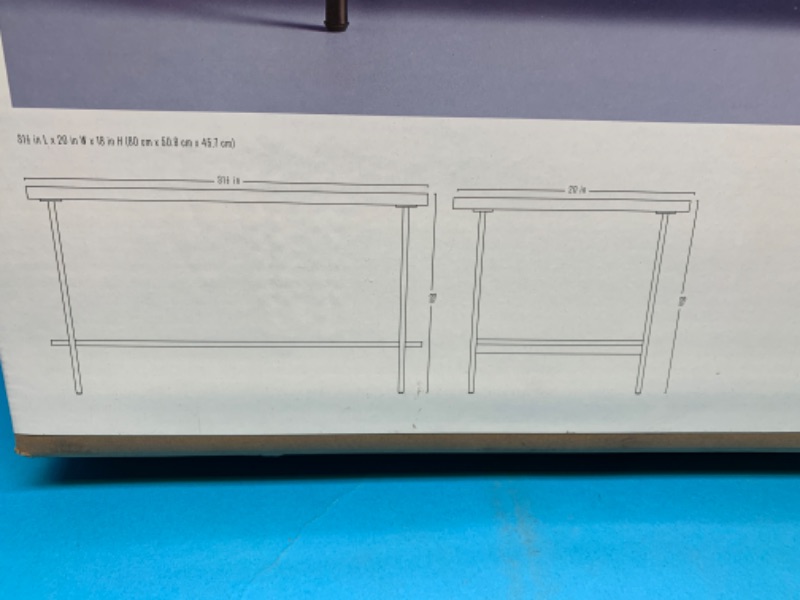 Photo 1 of 665033…wood and metal coffee table  31 x 20 x 18”
