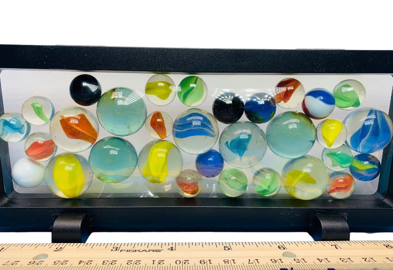 Photo 1 of 665510…vintage glass marbles in display stand 9 x 4”