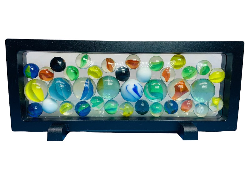 Photo 1 of 665515…vintage glass marbles in  9 x 4” display case 