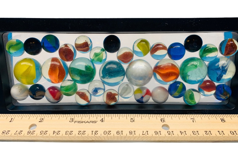 Photo 1 of 665531…vintage glass marbles in 9 x 4” display stand