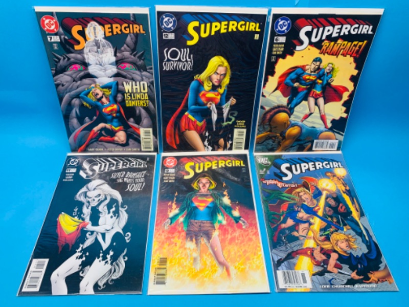 Photo 1 of 665565…6 super girl comics in plastic sleeves