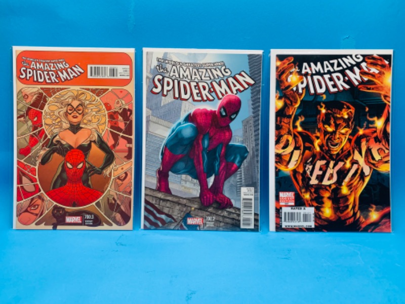 Photo 1 of 665777…3 variant Spider-Man comics in plastic sleeves 