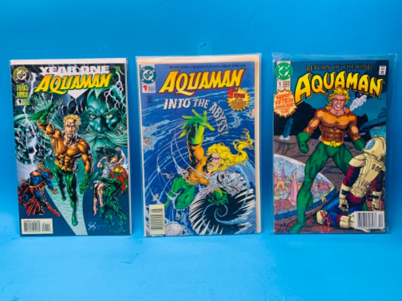 Photo 1 of 665782… 3 aquaman comics all #1’s in plastic sleeves 