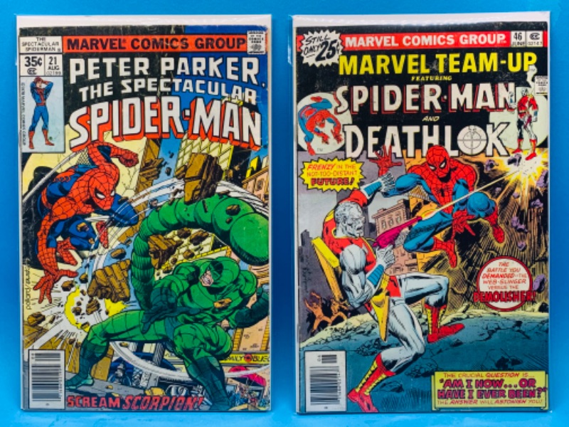 Photo 1 of 665815…2 vintage Spider-Man comics -condition issues- some bends, stains, etc in plastic sleeves