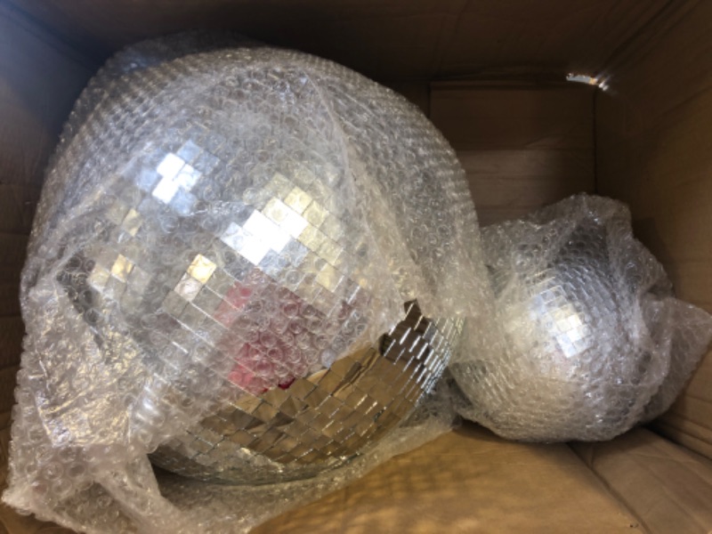 Photo 2 of 2 Pack Large Disco Ball Silver Hanging Mirror Disco Ball Reflective Mirror Disco Ball Ornament for Party Holiday Wedding Dance Music Festivals Decor Club Stage Props DJ Decoration (8 Inch, 16 Inch)
............................