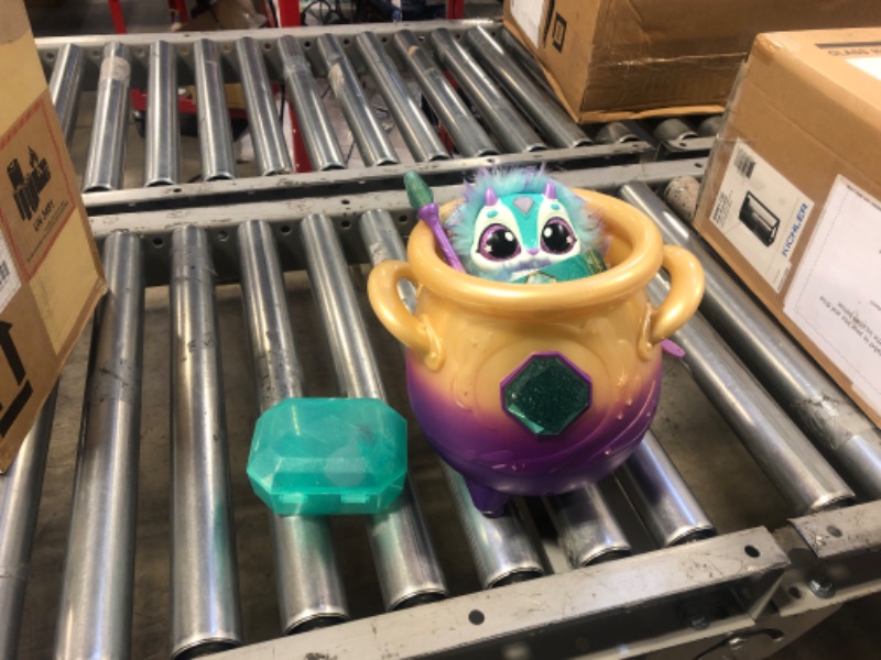 Photo 1 of Magic Mixies Magical Misting Cauldron with Interactive 8 inch Blue Plush Toy and 50+ Sounds and Reactions, Multicolor