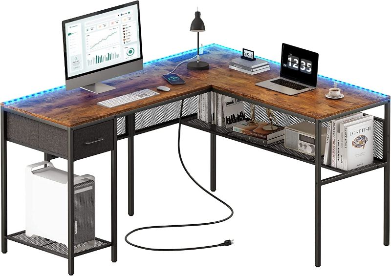 Photo 1 of SUPERJARE L Shaped Desk with Power Outlets & LED Lights, Reversible Computer Desk with Storage Shelves & Fabric Drawer, Corner Desk, Home Office Desk, Rustic Brown
