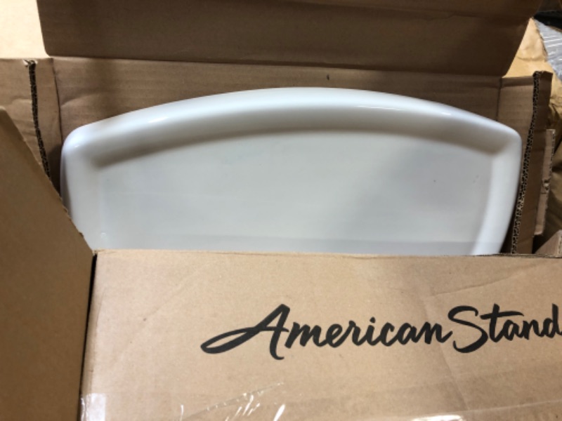 Photo 3 of American Standard ADA Toilet-to-GO W/Bone Finish 4149A104.020 CHAMPION4 HET 1.28 Tank WHT, 9.1 in wide x 18 in tall x 14.7 in deep, White