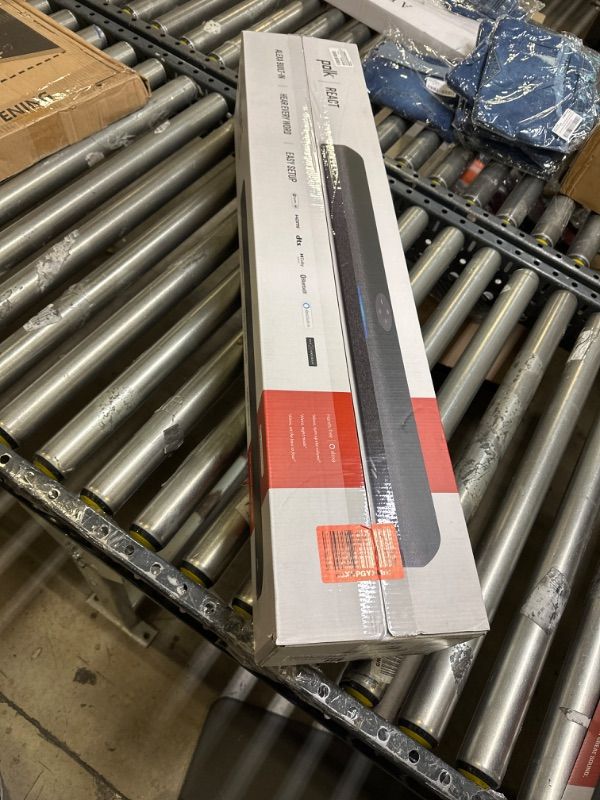 Photo 1 of Polk Audio React Sound Bar, Dolby & DTS Virtual Surround Sound, Next Gen Alexa Voice Engine with Calling & Messaging Built-in, Expandable to 5.1 with Matching React Subwoofer & SR2 Surround Speakers Soundbar (SN displayed on box is same as on the item) 