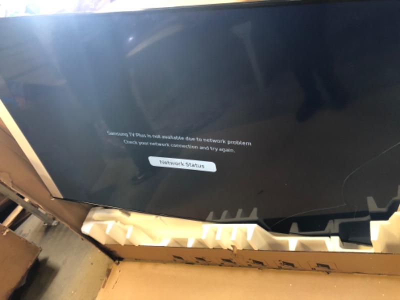 Photo 2 of SAMSUNG 75-Inch Class Crystal UHD AU8000 Series - 4K UHD HDR Smart TV, TV Only, Black
 DAMAGED, DISCOLORATION ON BOTTOM OF SCREEN, MISSING CORD 