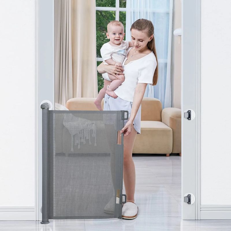 Photo 1 of BabyBond Retractable Baby Gates, Punch-Free Install Baby Gate Extra Wide 71” X 33” Tall for Kids or Pets Indoor and Outdoor Dog Gates for Doorways, Stairs, Hallways, Grey