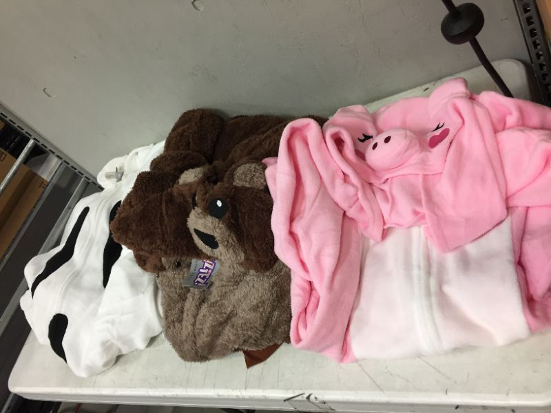 Photo 1 of BAG LOT- of random onesie Pjs, new & used, mixed sizes, some might be stained or dirty
