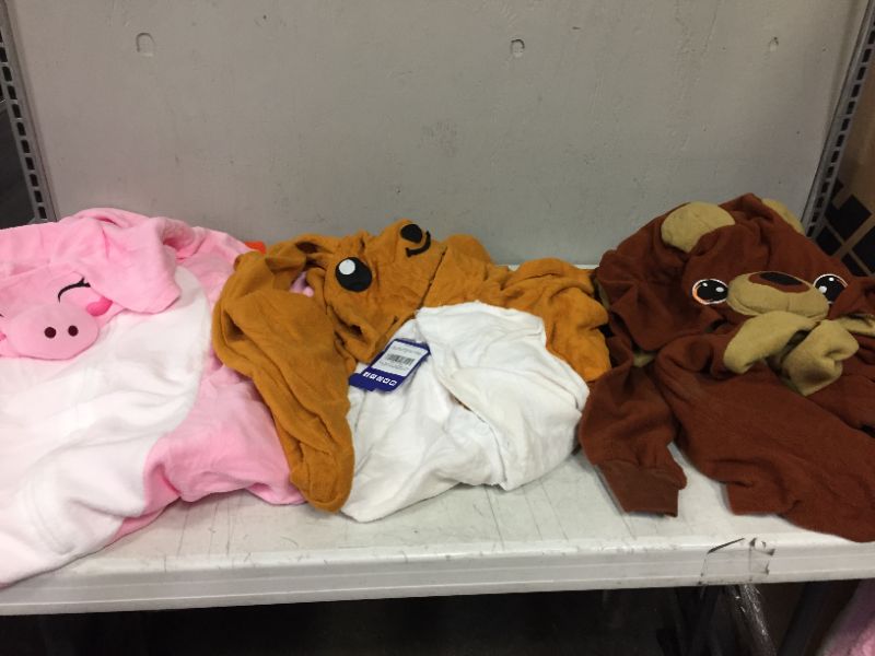 Photo 1 of BAG LOT OF RANDOM ONESIE PJS--MIXED SIZES AND STYLES--MIGHT BE STAINED OR DIRTY---