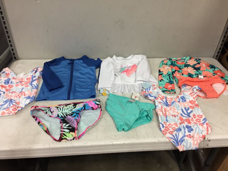 Photo 1 of BAG LOT OF 6 SWIM WEAR PIECES FOR BABY GIRL AND BOY --DIFFERENT STYLES AND SIZES --SOLD AS IS --