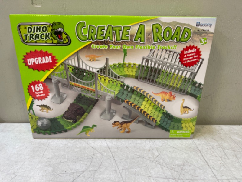 Photo 2 of Batlofty Dinosaur Toys Race Track, Flexible Track Playset, Create A Dinosaur World Road Race with 1 Dinosaur Car and 6 Dinosaur Toys for 3 4 5 6 7 Year Old Boys Girls Birthday Gifts
