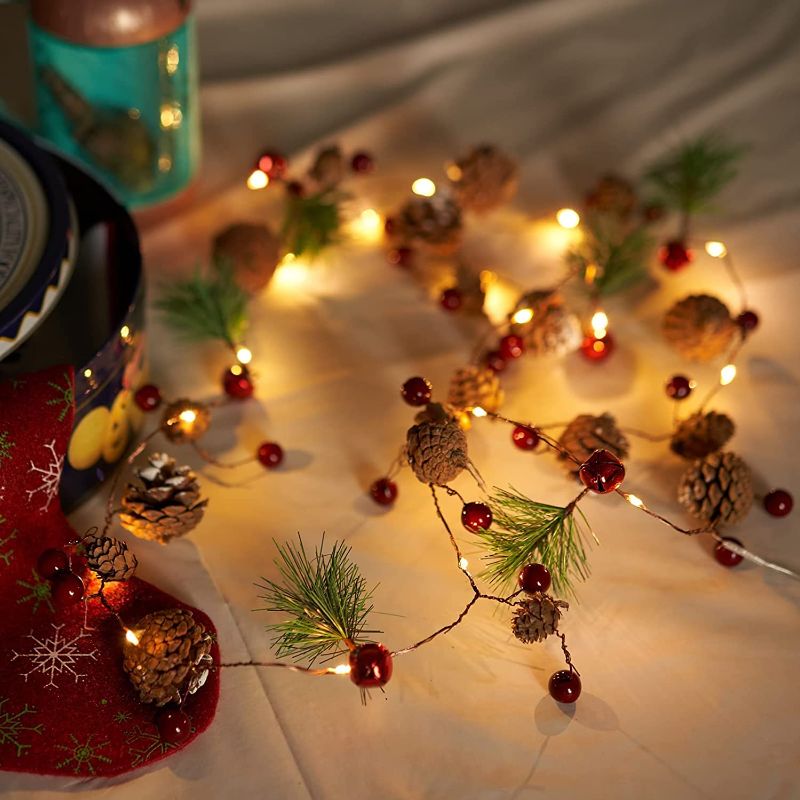 Photo 1 of 20 LED Christmas Garland String Lights, Xmas Pine Cone Light Battery Powered with Red Berry and Bells, Indoor/Outdoor Light for Xmas Decor Party New Year Thanksgiving Wedding Decorations
