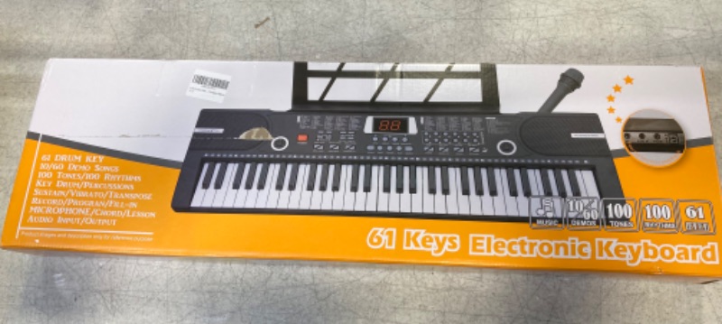Photo 1 of 61 Keys Keyboard Piano, Camide Electronic Digital Piano with Built-In Speaker Microphone, Sheet Stand and Power Supply, Portable Keyboard Gift Teaching for Beginners
