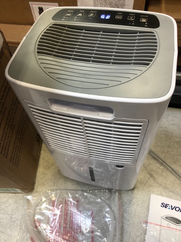 Photo 3 of 30 Pint Dehumidifiers for 2000 Sq. Ft Home Basements with Drain Hose, SEAVON Dehumidifier with Auto and Manual Drainage, 12 Hours Timer, Child Lock, Dry Clothes, Intelligent Humidity Control for Bedroom, Bathroom, Laundry Room, Office
OPEN BOX ITERM 