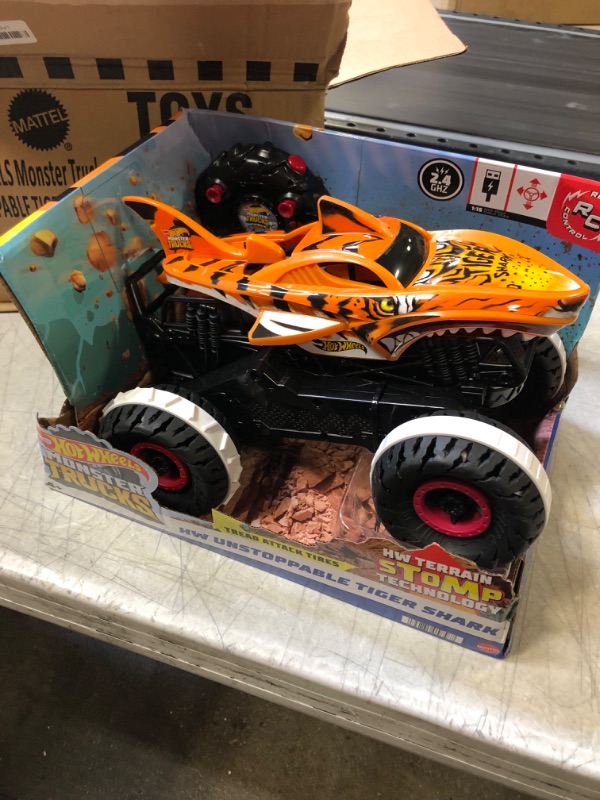 Photo 2 of Hot Wheels Monster Trucks, Remote Control Car, Monster Truck Toy with All-Terrain Wheels, 1:15 Scale Unstoppable Tiger Shark RC