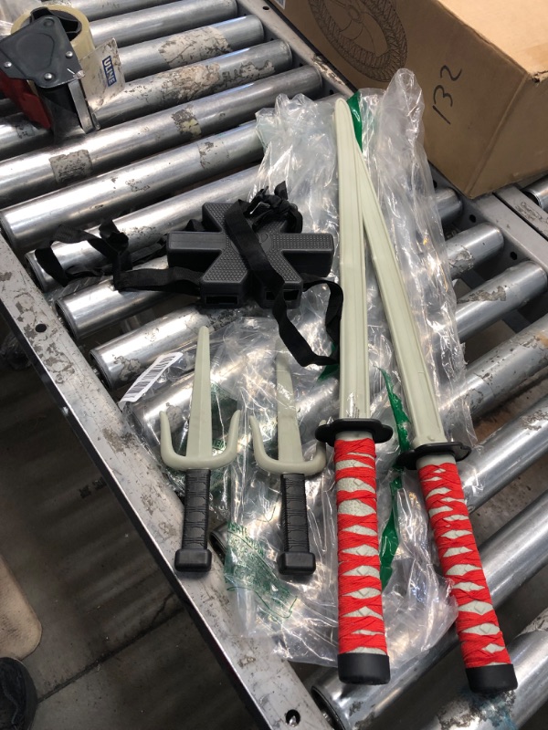 Photo 1 of BUNDLE OF TOY SWORDS 