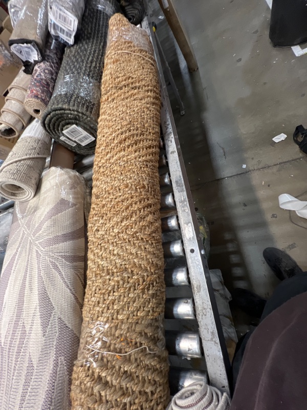 Photo 1 of 4ft jute rug 