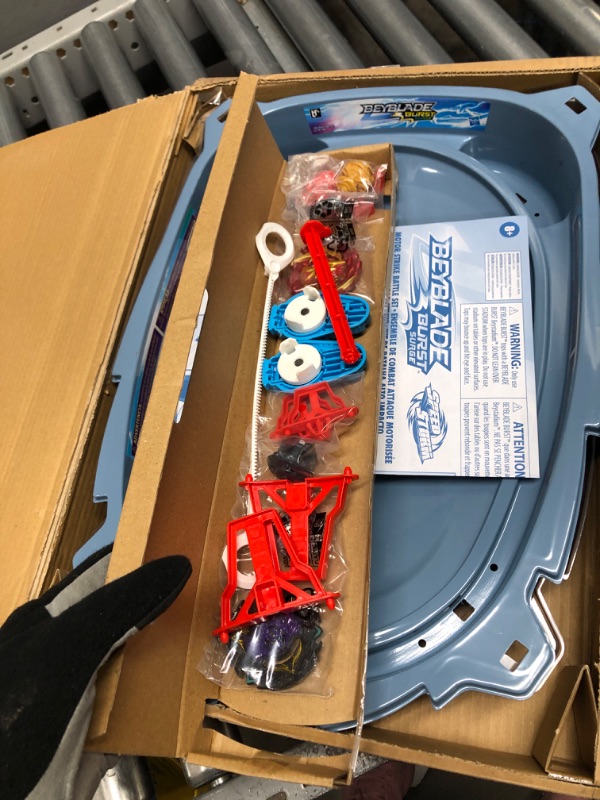 Photo 1 of BEYBLADE Burst Surge Speedstorm Motor Strike Battle Set -- Battle Game playset with Motorized Stadium, 2 Battling Top Toys and 2 Launchers