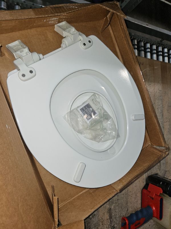 Photo 2 of (SEE NOTES) MAYFAIR 1888SLOW 000 NextStep2 Toilet Seat with Built-In Potty Training Seat, Slow-Close, Removable that will Never Loosen, ELONGATED, White White Elongated Toilet Seat