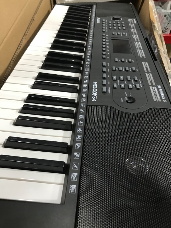 Photo 2 of Alesis Melody 54-54-Key Electric Piano Keyboard with Speakers, Microphone, Music Rest + Numark HF125 - On-Ear Headphones with 6ft Cable