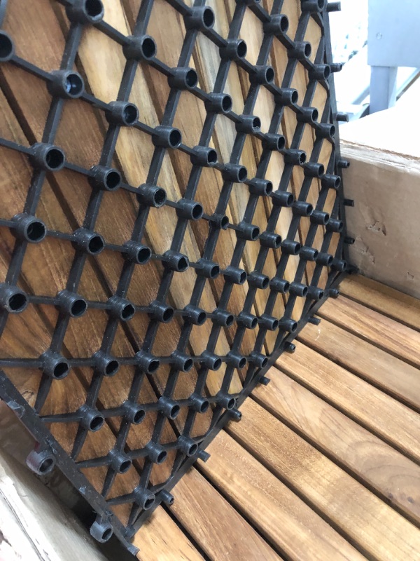 Photo 1 of * one tile is damaged * see all images * 
Bare Decor Solid Oiled Teak Wood Interlocking 9-Slat Flooring Tiles -