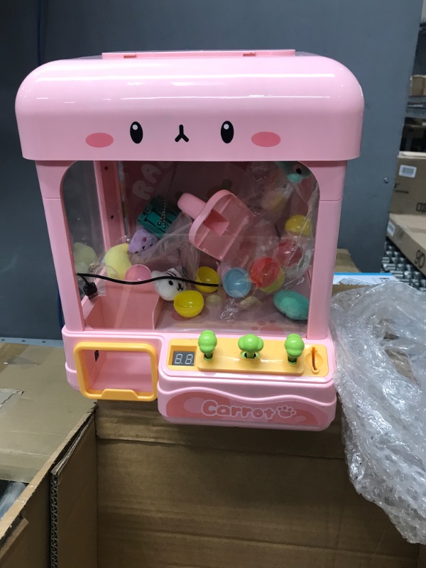 Photo 2 of cxjoigxi Mini Claw Machine for Kids Adults with Prizes,Volume Control and 60 Seconds Countdown,2 Power Supply Modes,Candy Gumball Vending Machines Toys for 4-7 8-12 Year Old Boy Girl Gift Ideas-Bunny