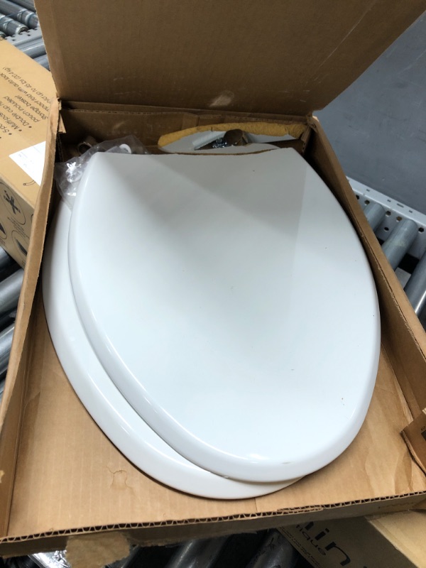 Photo 2 of **PARTS ONLY**
Mayfair Slow Close Elongated White Molded Wood Toilet Seat