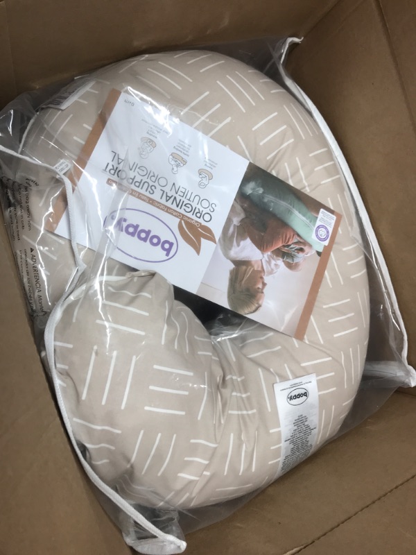 Photo 2 of Boppy Nursing Pillow Organic Original Support, Sand Criss Cross, Ergonomic Nursing Essentials for Bottle and Breastfeeding, Firm Hypoallergenic Fiber Fill with 100% Organic Cotton Nursing Pillow Cover