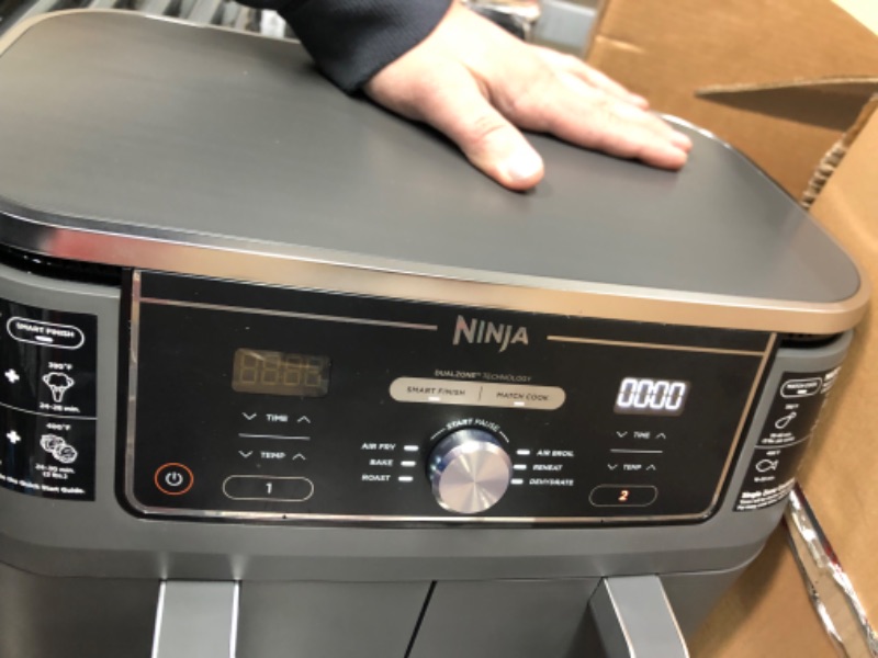 Photo 2 of Ninja DZ401 Foodi 10 Quart 6-in-1 DualZone XL 2-Basket Air Fryer with 2 Independent Frying Baskets, Match Cook & Smart Finish to Roast, Broil, Dehydrate & More for Quick, Easy Family-Sized Meals, Grey