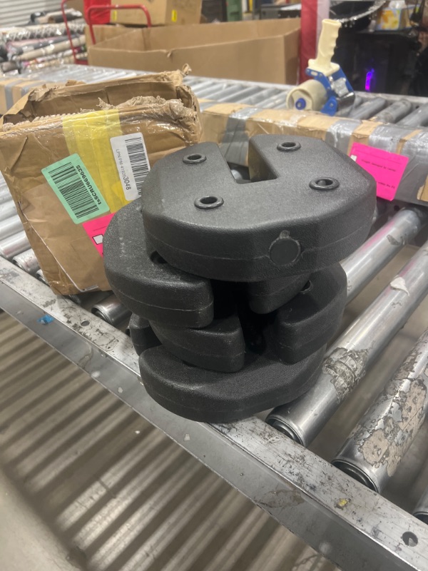 Photo 1 of weights to hold canopys down 