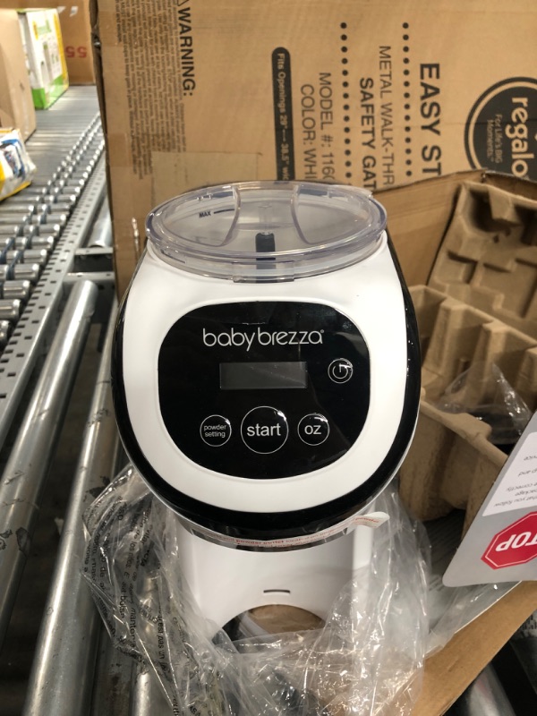 Photo 2 of Baby Brezza Formula Pro Mini Baby Formula Maker – Small Baby Formula Mixer Machine Fits Small Spaces and is Portable for Travel– Bottle Makers Makes The Perfect Bottle for Your Infant On The Go Formula Pro Mini Dispenser Machine