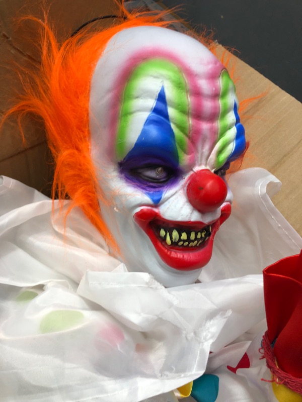 Photo 1 of 2.5 ft. Animated Clown Groundbreaker, Indoor or Covered Outdoor Halloween Decoration, Red LED Eyes, Battery-Operated
