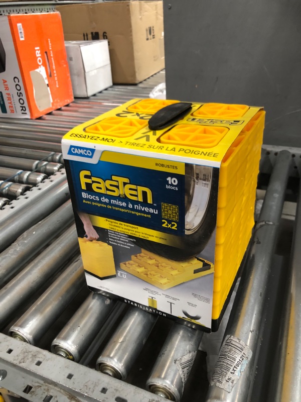 Photo 2 of Camco FasTen 2x2 RV Leveling Block For Single Tires, Interlocking Design Allows Stacking To Desired Height, Includes Secure T-Handle Carrying System, Yellow (Pack of 10) Yellow Single Tire Standard Packaging