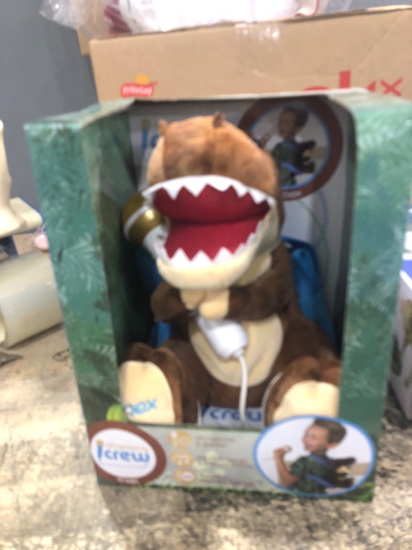 Photo 2 of Singing Machine Portable Karaoke Machine for Kids, Plush Toy Backpack with Microphone - The Sing Along Crew, Lil Rex (Brown & Beige) - Built-In Karaoke Speaker with Songs, Sound Effects, & Recorder T-Rex