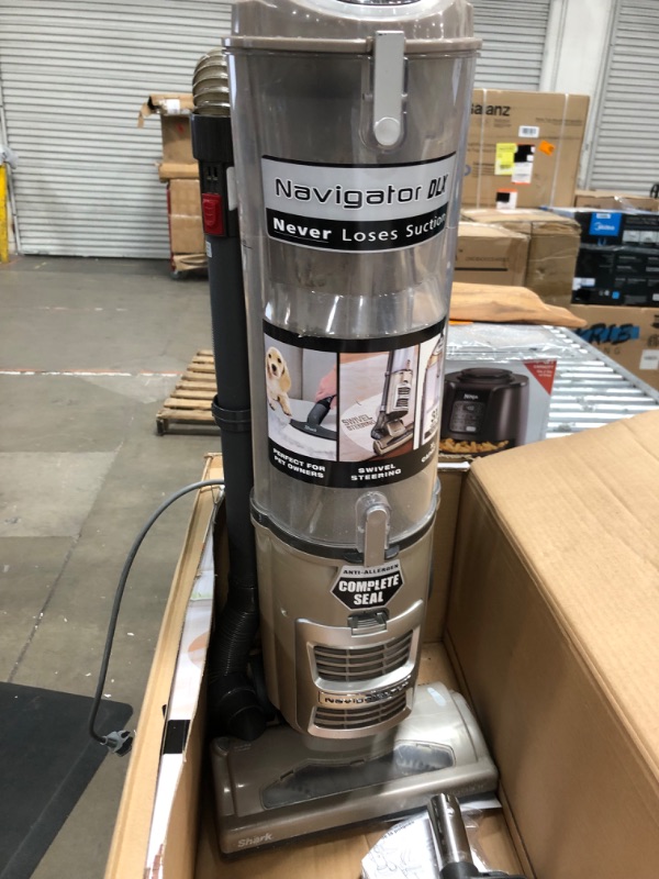 Photo 1 of Shark Navigator DLX Upright Vacuum Cleaner in Bronze