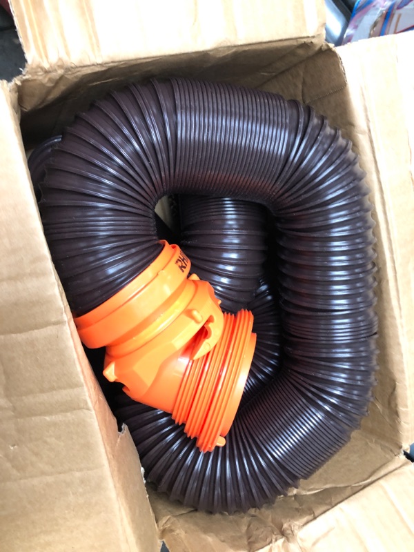 Photo 2 of Camco RhinoFLEX RV Sewer Hose Kit with Swivel Transparent Elbow and 4-in-1 Dump Station Fitting, Brown, 15 Feet (39770) 15ft Sewer Hose Kit Frustration-Free Packaging