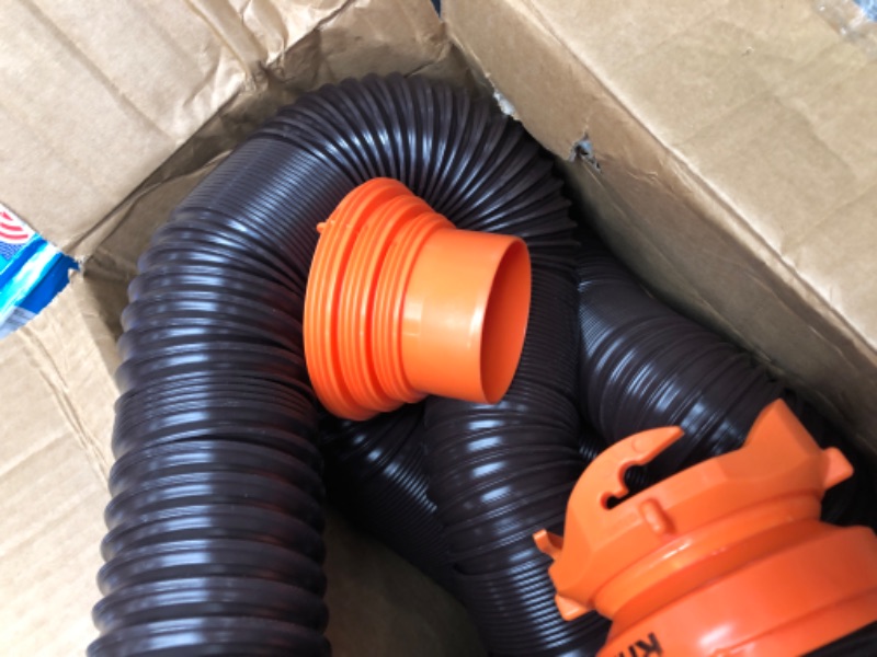 Photo 3 of Camco RhinoFLEX RV Sewer Hose Kit with Swivel Transparent Elbow and 4-in-1 Dump Station Fitting, Brown, 15 Feet (39770) 15ft Sewer Hose Kit Frustration-Free Packaging