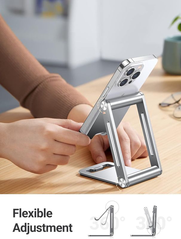 Photo 1 of  Phone Stand for Desk Cell Phone Holder Adjustable Compatible with iPhone 15 14 13 12 Pro Max 11 XS Max XR X 8 Plus, Nintendo Switch, Aluminum Metal Desktop Phone Stand Portable, Silver
