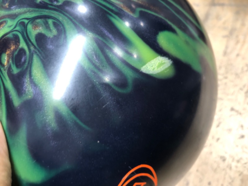 Photo 3 of **BALL IS CHIPPED**
13 LBS Columbia 300 Madness Bowling Ball
