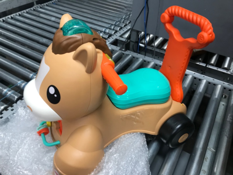 Photo 2 of 
Fisher-Price Baby Walker Learning Toy, Walk Bounce & Ride Pony Ride-On with Music and Lights for Infants and Toddlers Ages 9+ Months
