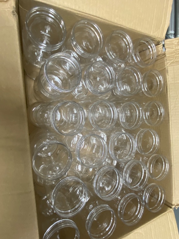 Photo 1 of 48 clear jars 