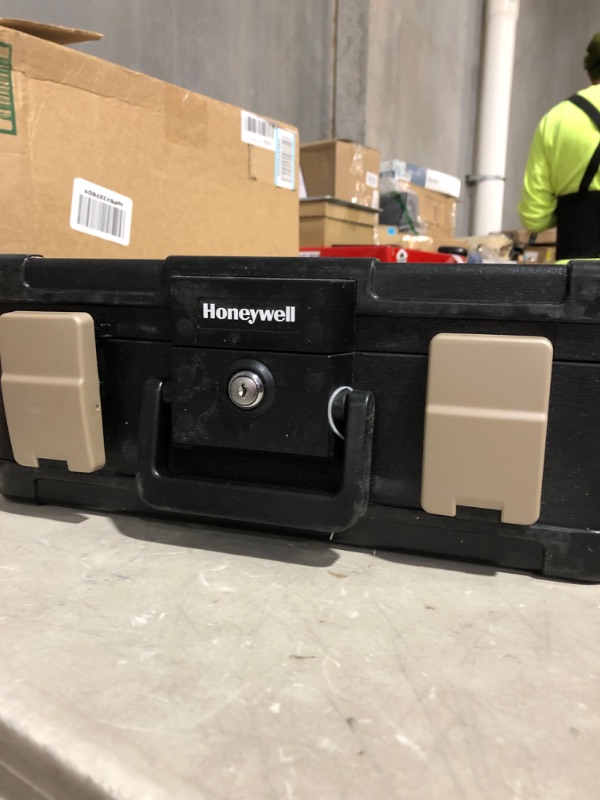 Photo 2 of * used item * see all images * 
Honeywell 0.24 cu. ft. Molded Fire Resistant and Waterproof Portable Chest with Carry Handle