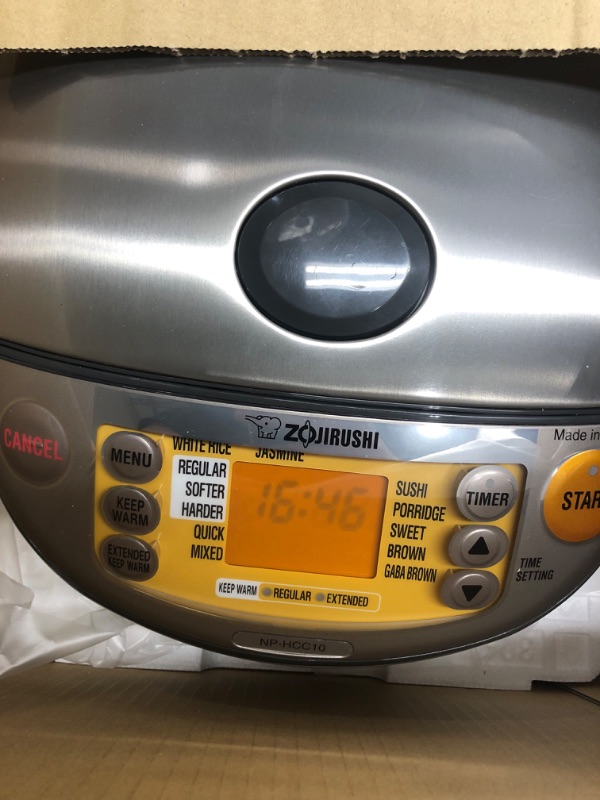 Photo 4 of **DAMAGE**
Zojirushi NP-HCC10XH Induction Heating System Rice Cooker and Warmer, 1 L