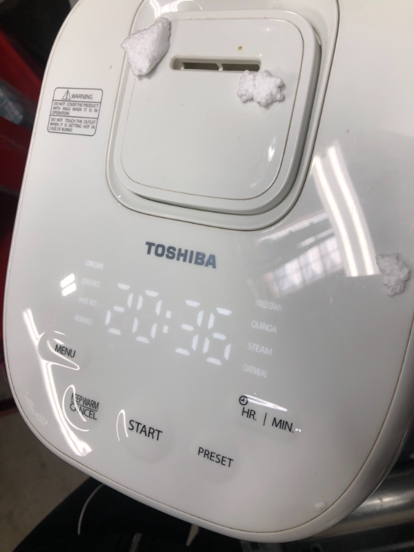 Photo 3 of **SEE NOTES**
Toshiba Low Carb Digital Programmable Multi-functional Rice Cooker, Slow Cooker, Steamer & Warmer, 5.5 Cups Uncooked with Fuzzy Logic and One-Touch Cooking, 24 Hour Delay Timer and Auto Keep Warm Feature, White